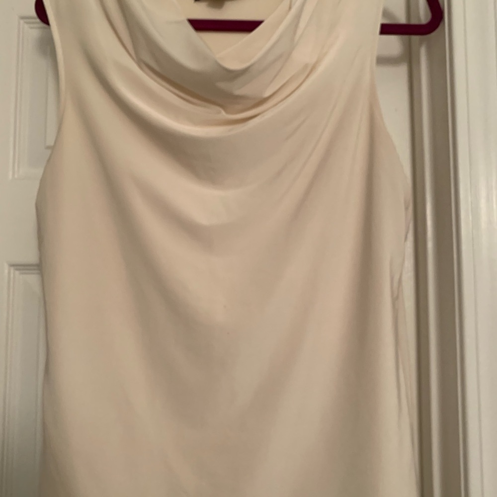 Beautiful tank top that can make any outfit dressy.